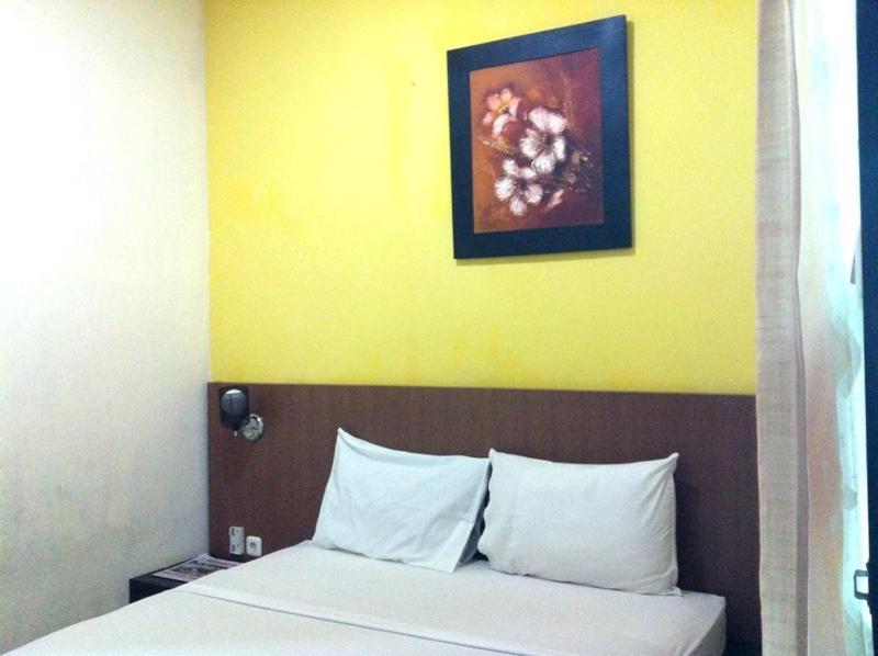 Hotel O Padang City Center Near Pantai Padang Formerly D'Dhave Hotel Room photo